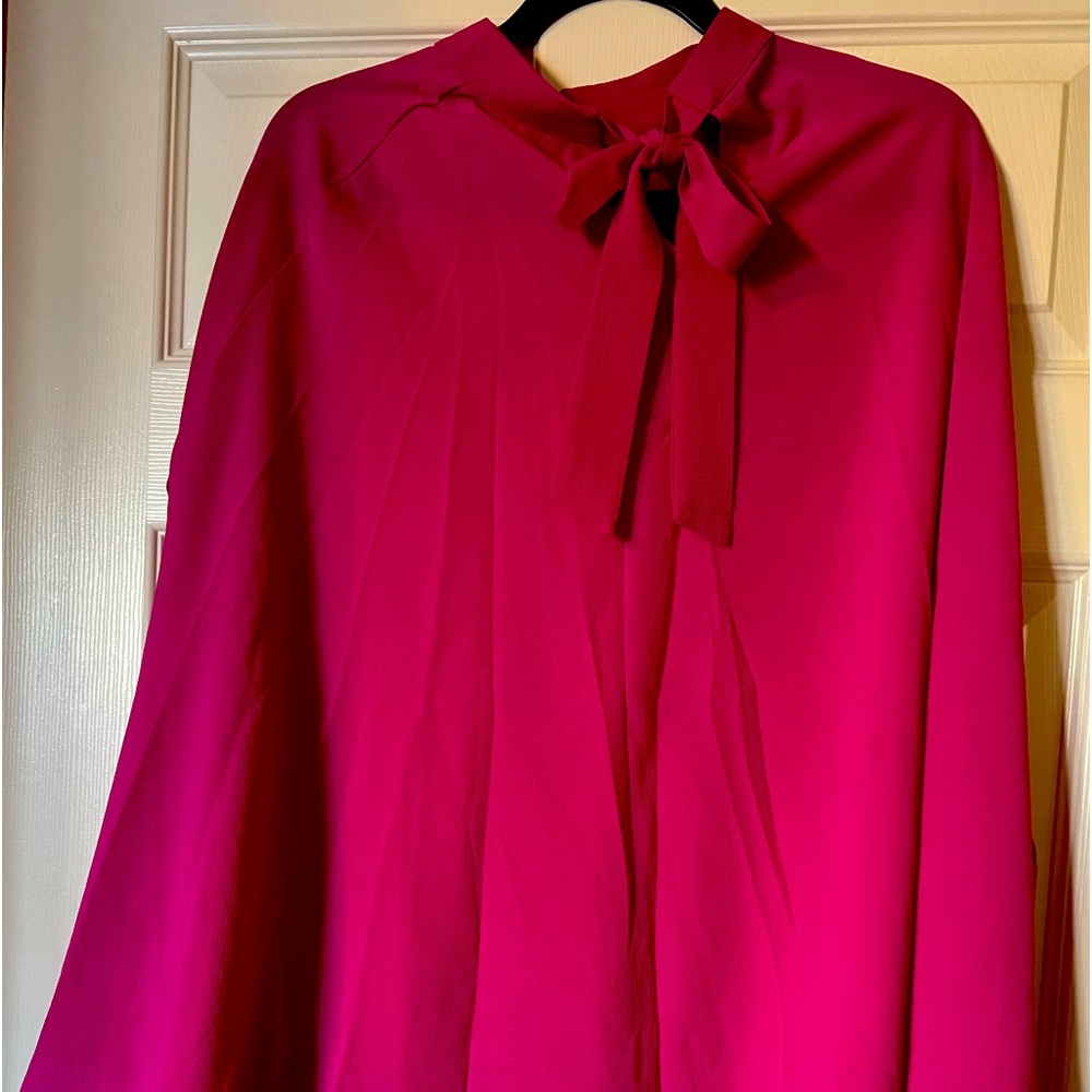 Super cute hot pink poncho with arm holes